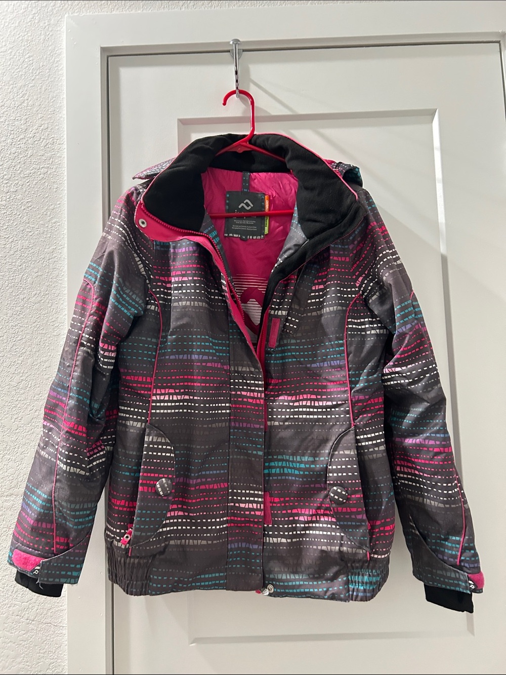 Insulated Hooded Jacket - Gray with Pink & Teal Accents top left pocket.